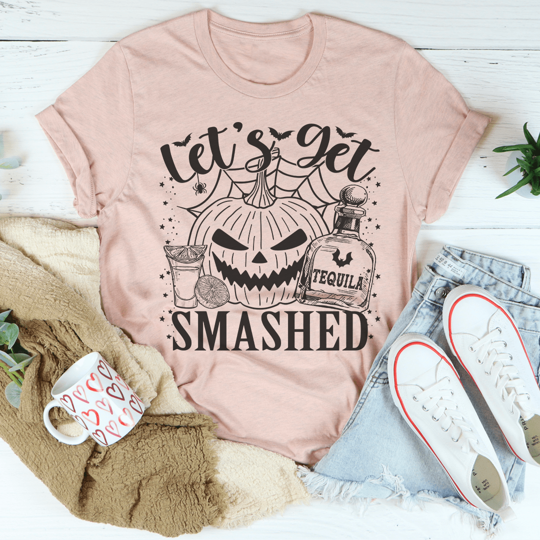 Let's Get Smashed Pumpkin T-Shirt featuring a vibrant pumpkin design on a soft cotton fabric.