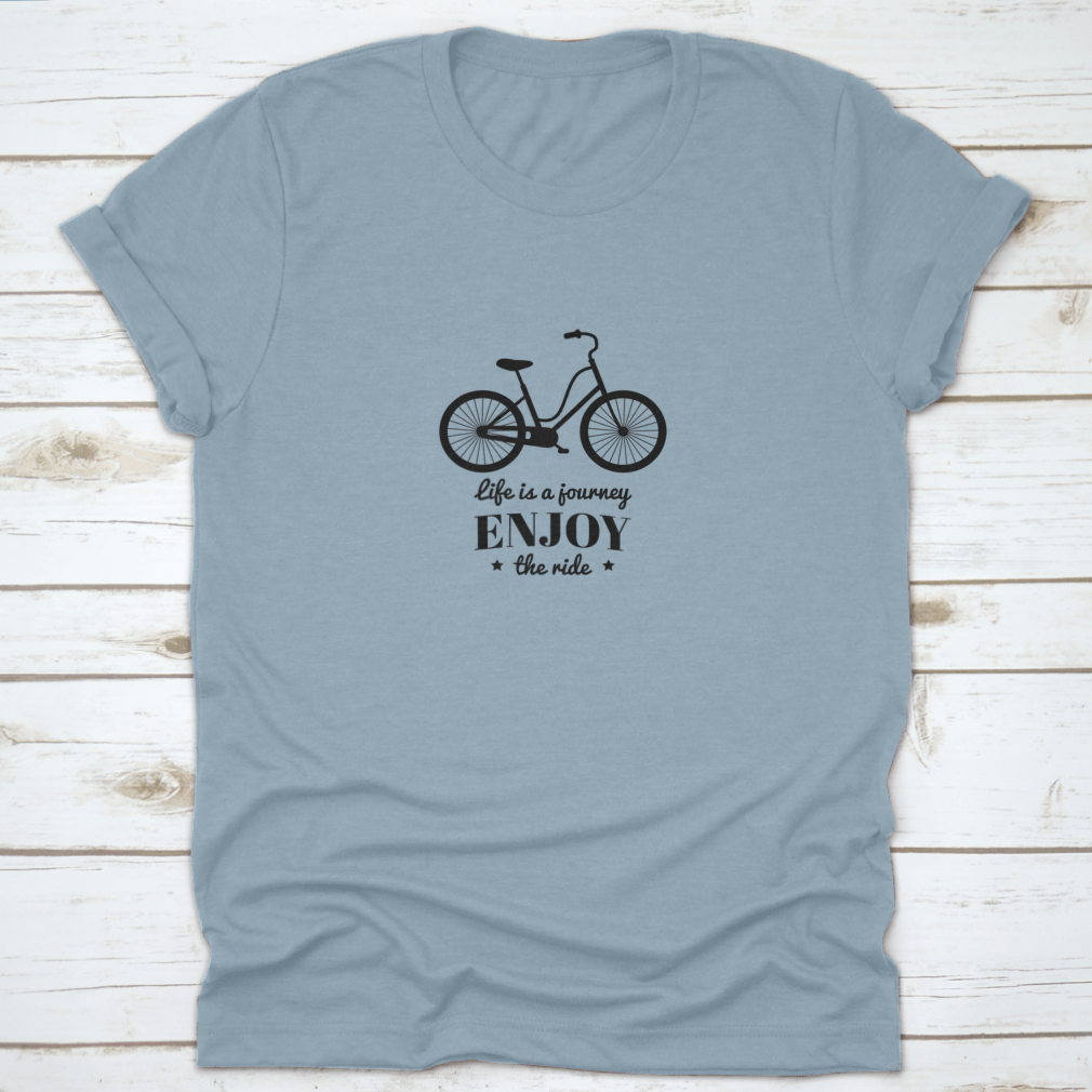 A motivational quote t-shirt featuring 'Life Is A Journey, Enjoy The Ride' printed on it, made from soft cotton fabric.