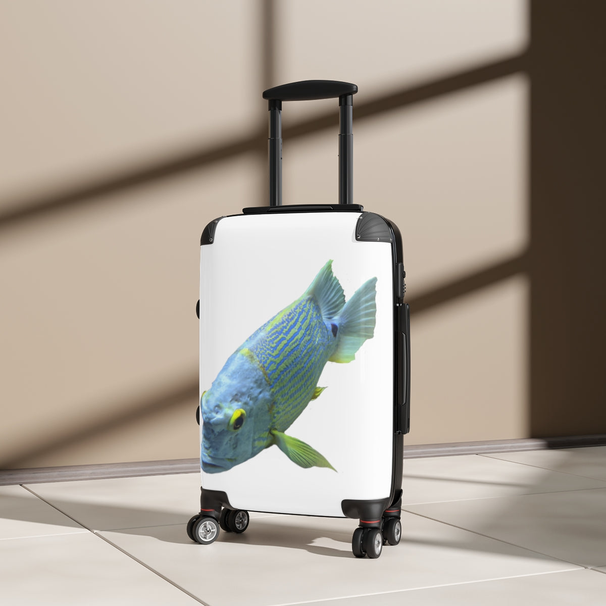 Light Blue Fish Cabin Suitcase with personalized design, showcasing its durable polycarbonate shell and adjustable handle.