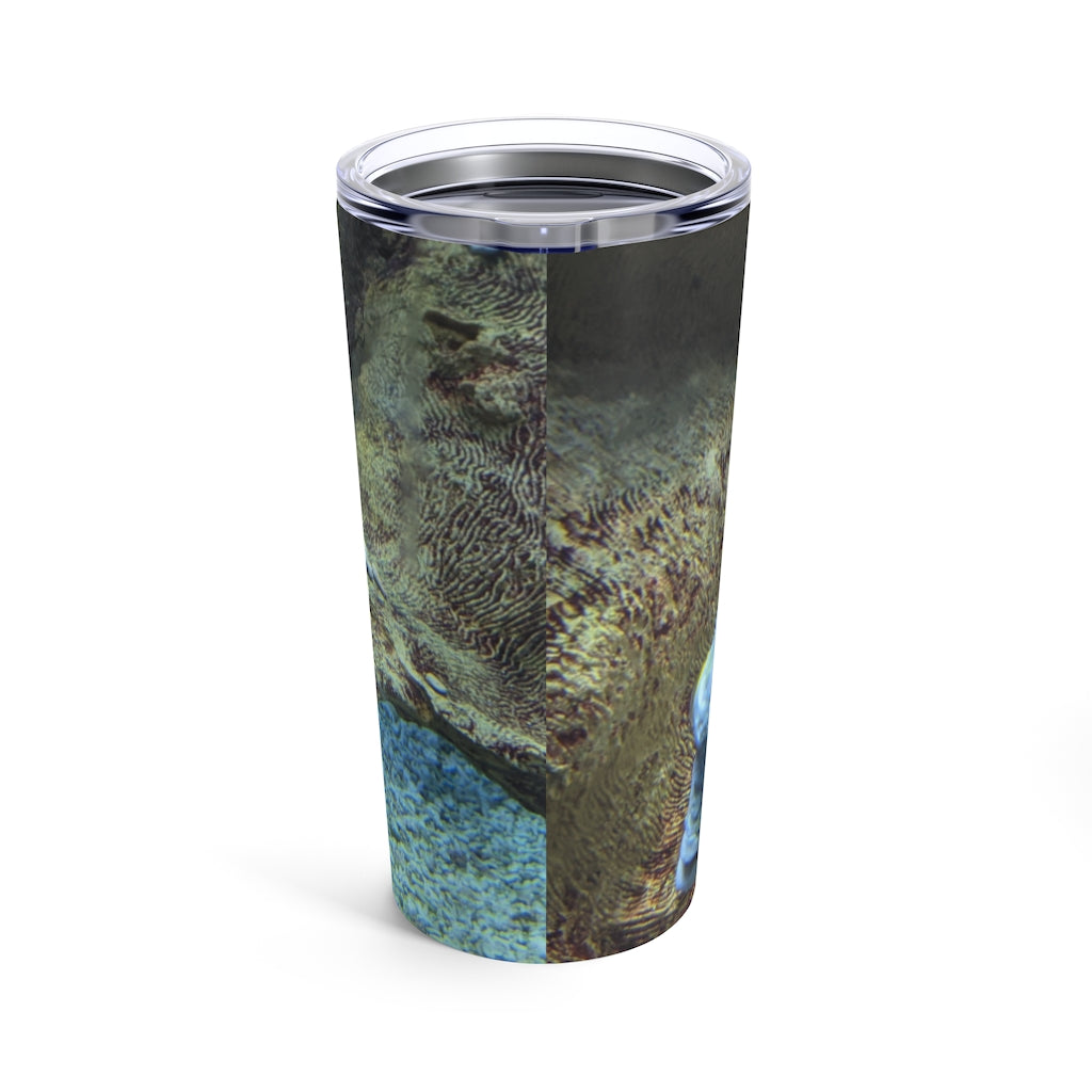 Light Blue Fish Tumbler 20oz made of stainless steel with a see-thru plastic lid, showcasing a stylish design perfect for travel.
