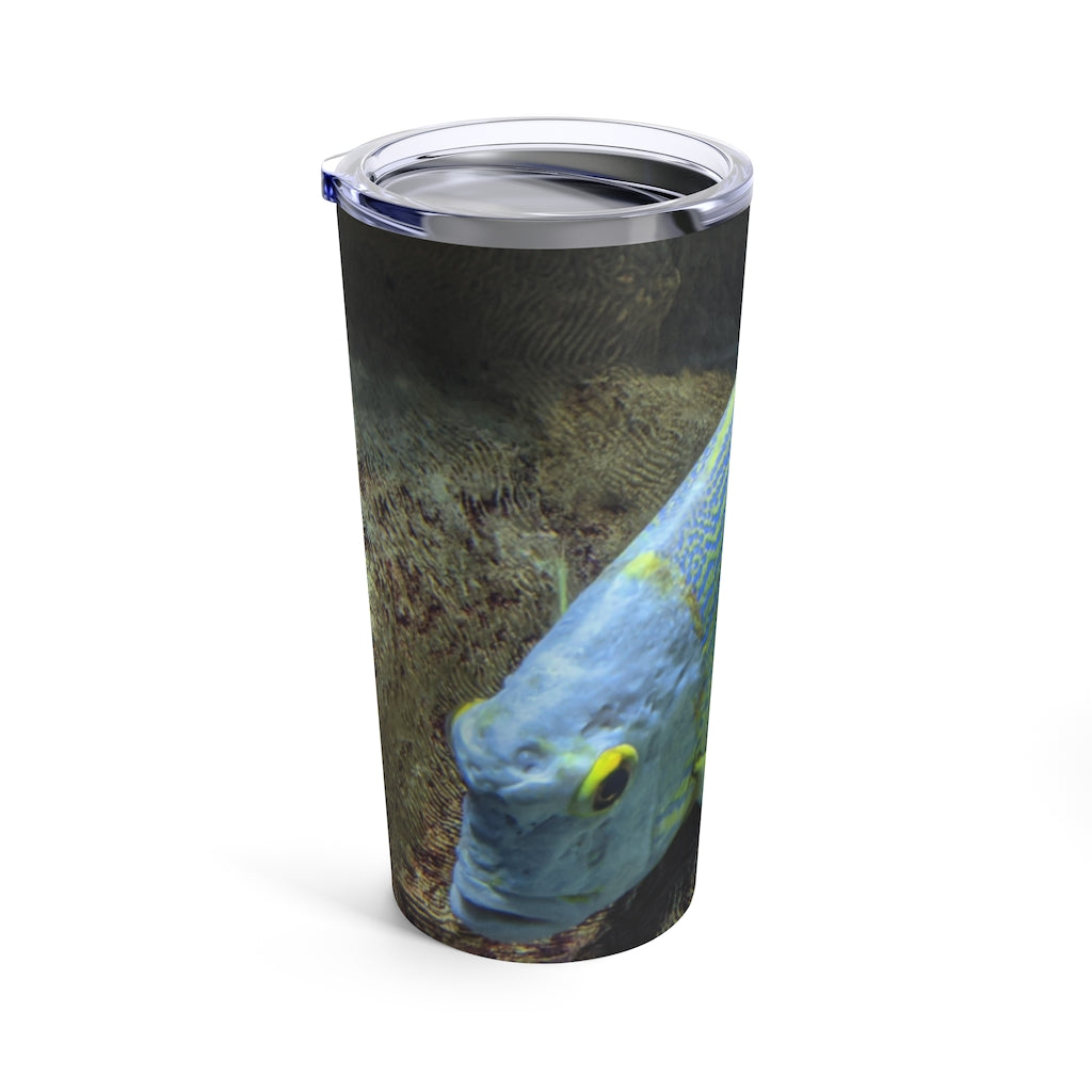Light Blue Fish Tumbler 20oz made of stainless steel with a see-thru plastic lid, showcasing a stylish design perfect for travel.