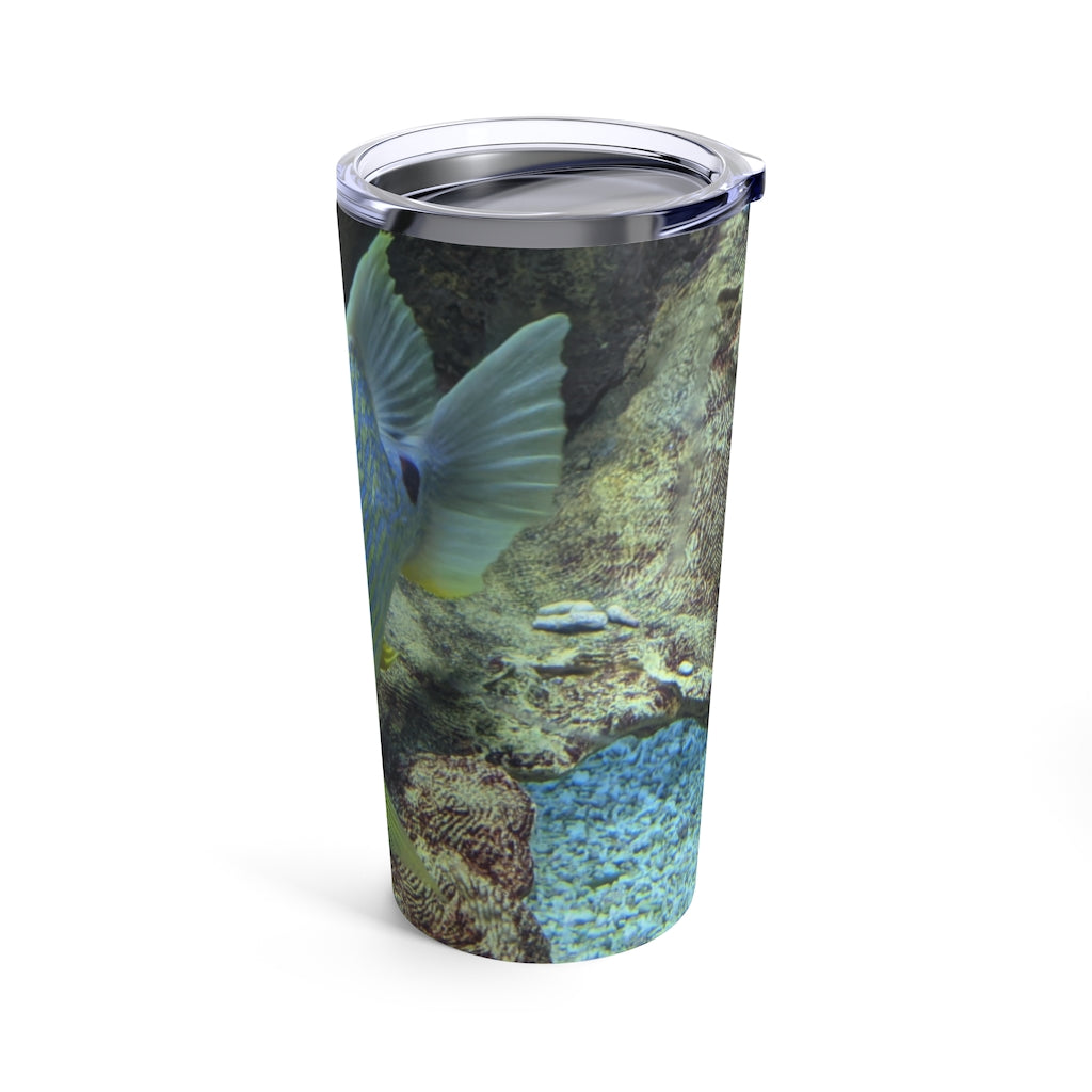 Light Blue Fish Tumbler 20oz made of stainless steel with a see-thru plastic lid, showcasing a stylish design perfect for travel.