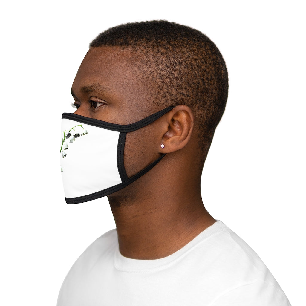 Lilly Mixed-Fabric Face Mask featuring a black outer edge and earloops, made from polyester and cotton for comfort and style.