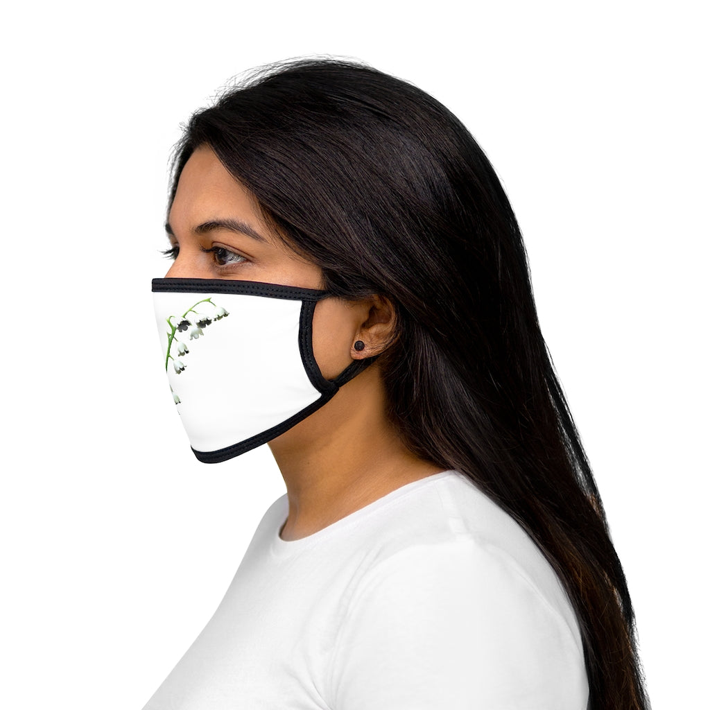 Lilly Mixed-Fabric Face Mask featuring a black outer edge and earloops, made from polyester and cotton for comfort and style.
