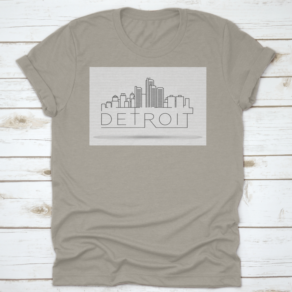 A stylish Linear Detroit City Silhouette T-shirt featuring a unique typographic design, made from soft cotton fabric.