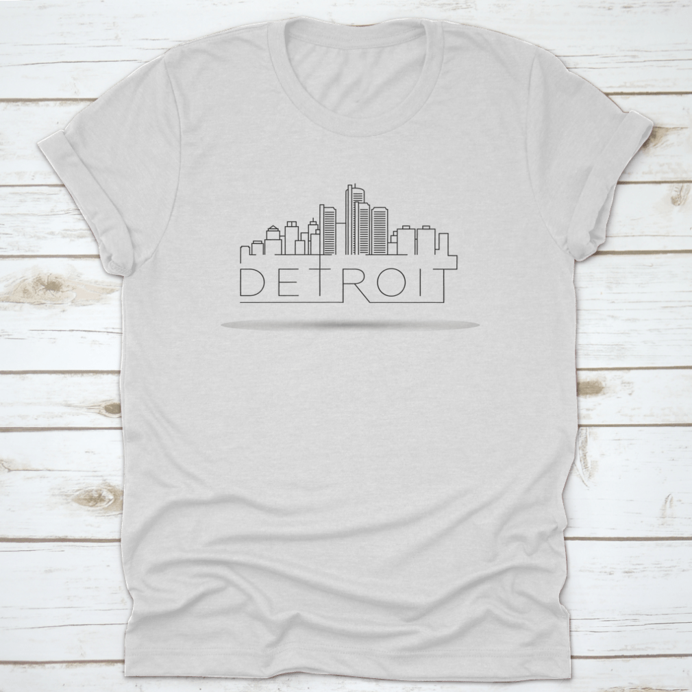 A stylish Linear Detroit City Silhouette T-shirt featuring a unique typographic design, made from soft cotton fabric.