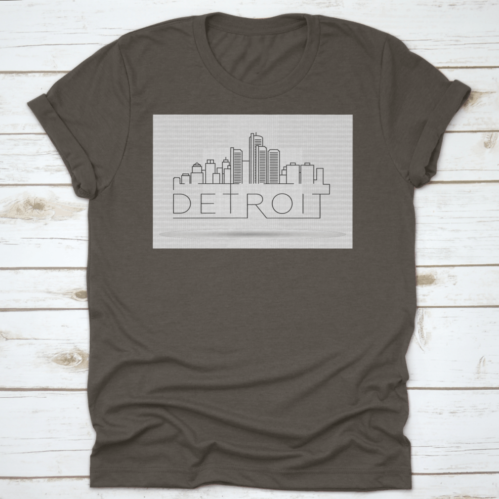 A stylish Linear Detroit City Silhouette T-shirt featuring a unique typographic design, made from soft cotton fabric.