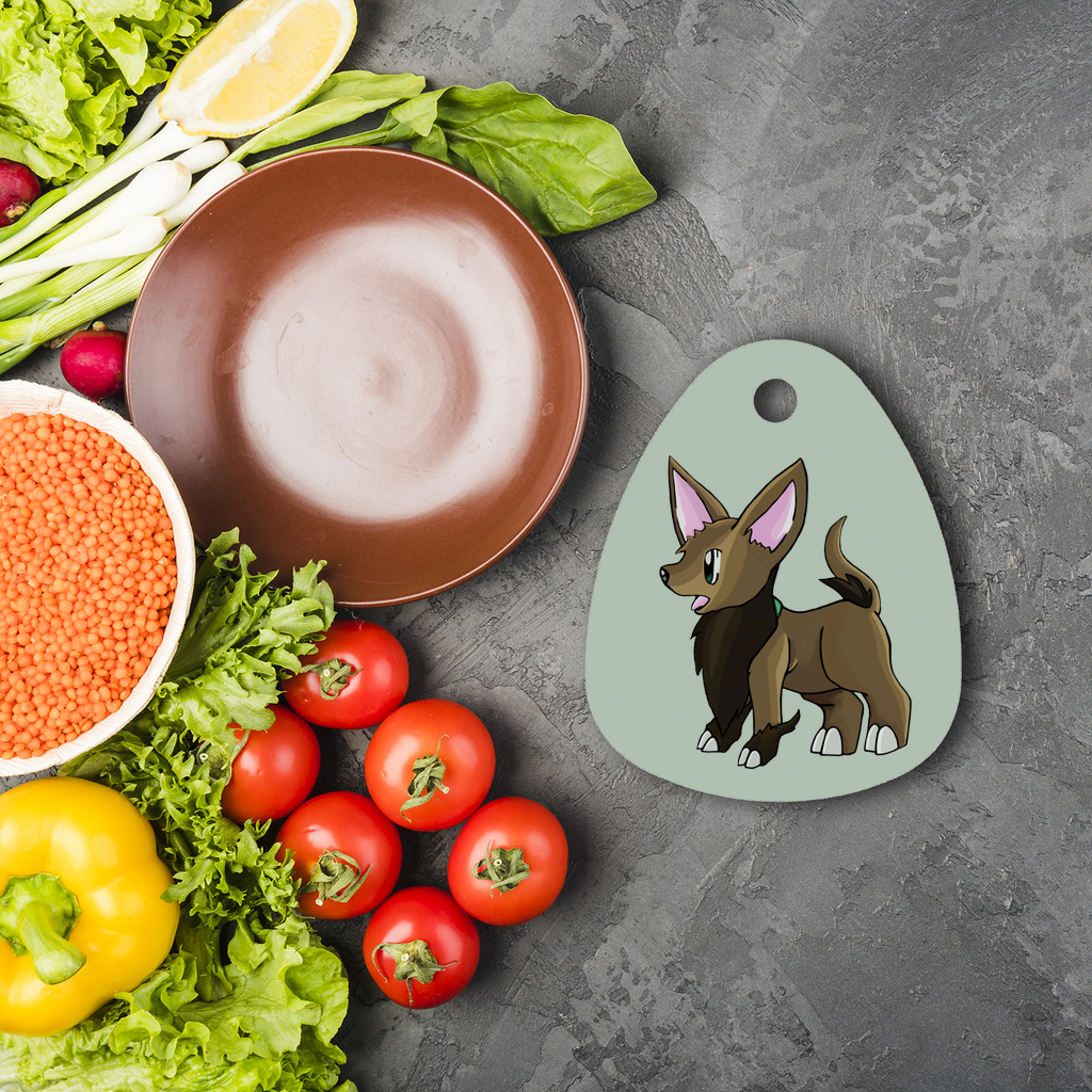 Lipgirl Sublimation Glass Cutting Board in water droplet shape, made of toughened chinchilla glass, featuring rubber feet for stability.