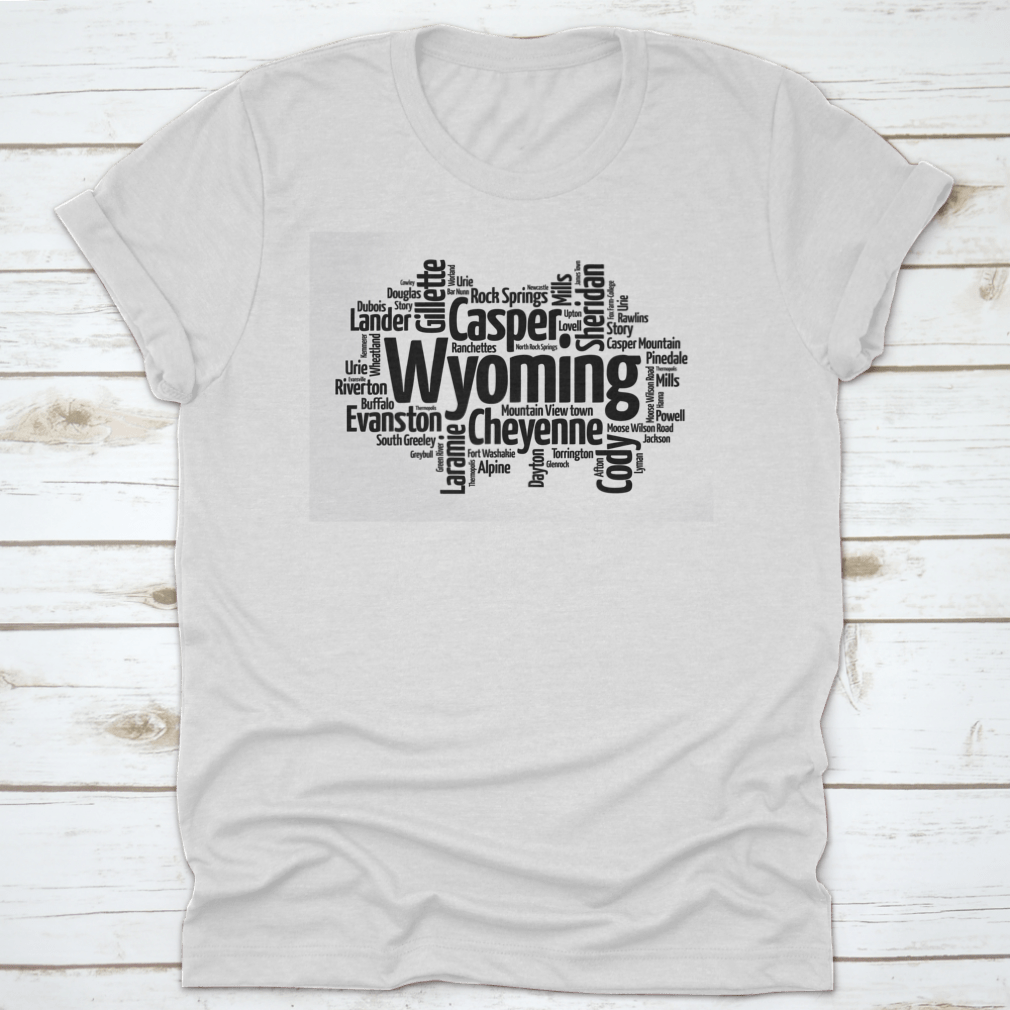 A stylish t-shirt featuring a word cloud design of cities in Wyoming, showcasing the state's unique landscape and culture.