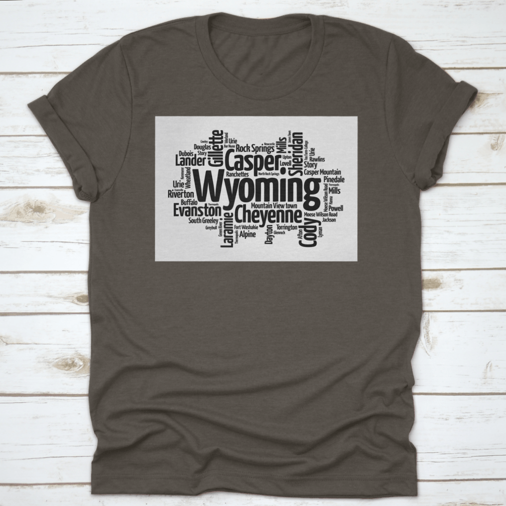 A stylish t-shirt featuring a word cloud design of cities in Wyoming, showcasing the state's unique landscape and culture.