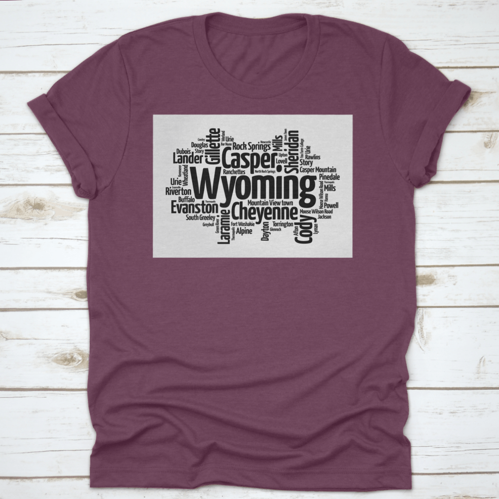 A stylish t-shirt featuring a word cloud design of cities in Wyoming, showcasing the state's unique landscape and culture.