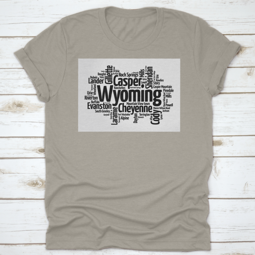 A stylish t-shirt featuring a word cloud design of cities in Wyoming, showcasing the state's unique landscape and culture.