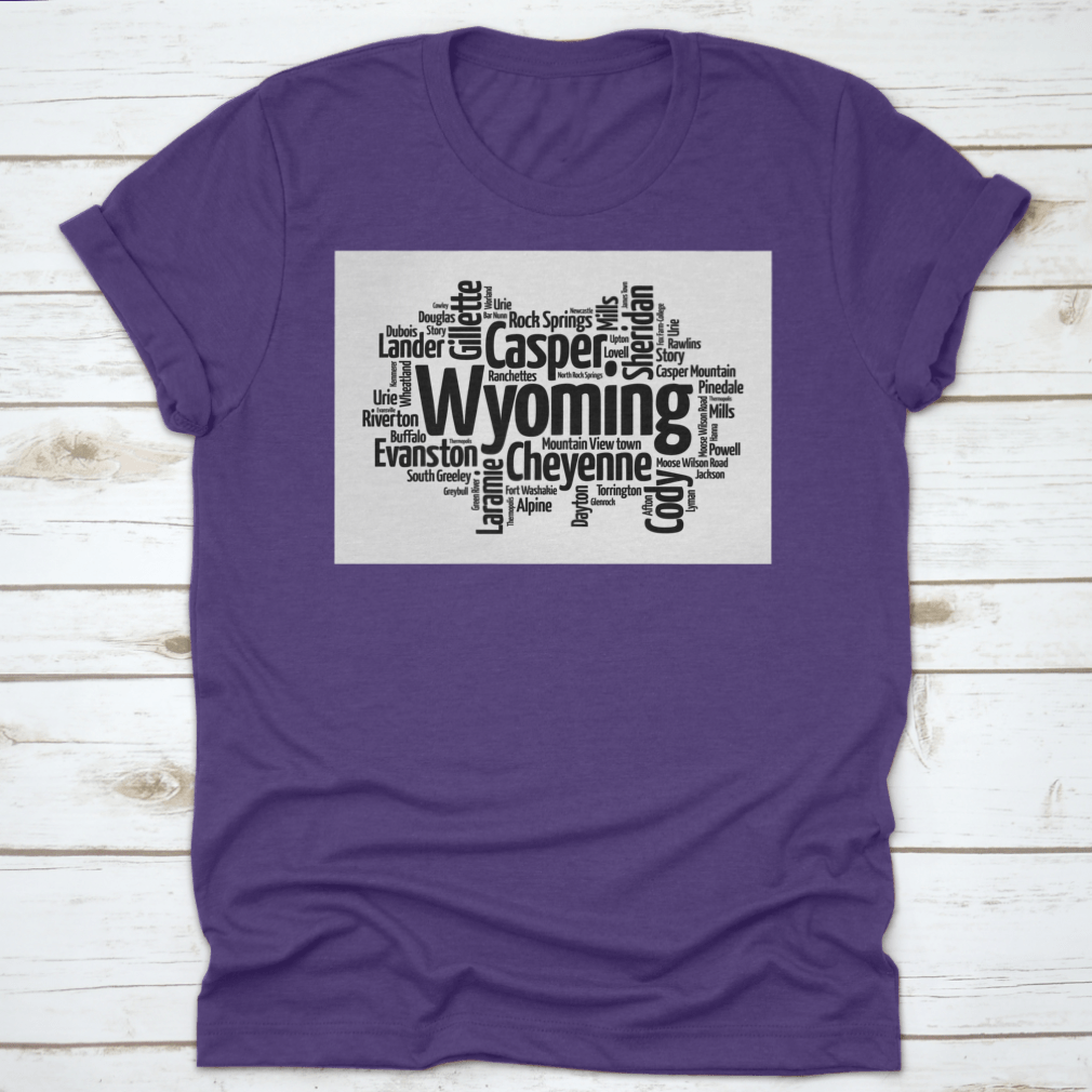 A stylish t-shirt featuring a word cloud design of cities in Wyoming, showcasing the state's unique landscape and culture.