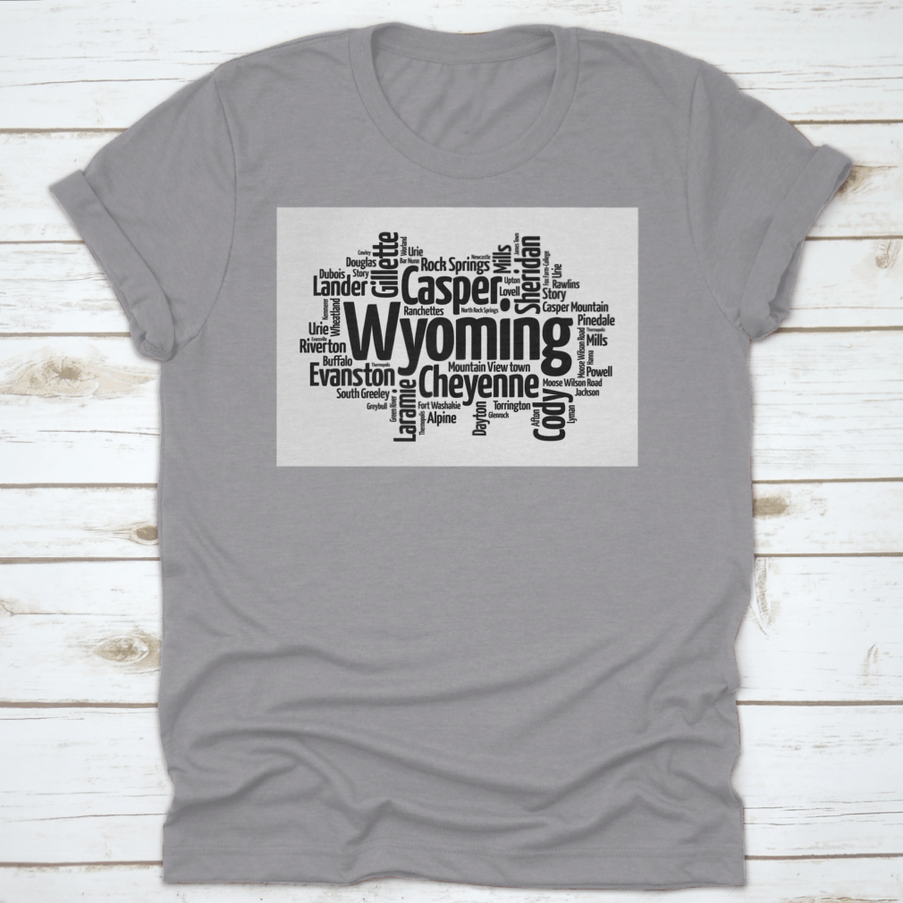 A stylish t-shirt featuring a word cloud design of cities in Wyoming, showcasing the state's unique landscape and culture.