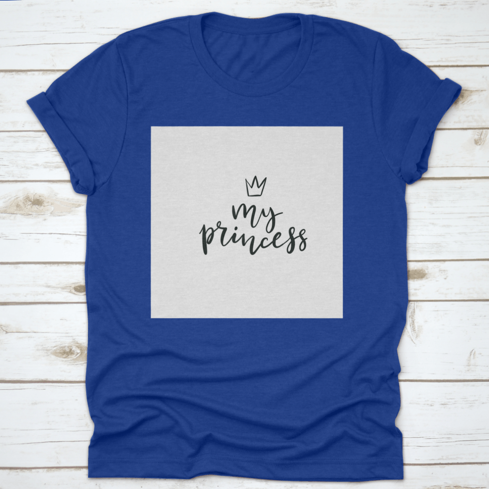 A stylish cotton t-shirt featuring a Little Princess Crown Calligraphy design, showcasing elegance and personalization.