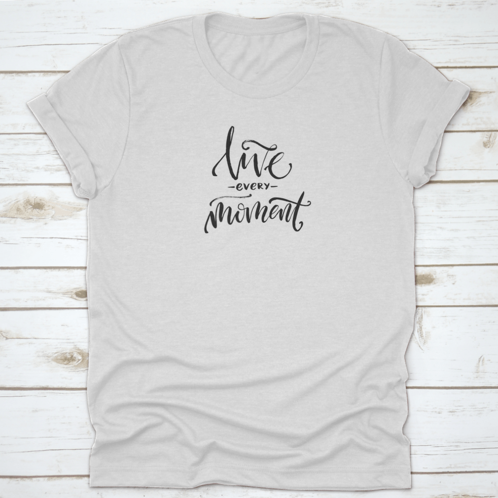 A stylish 'Live Every Moment' tee shirt displayed on a mannequin, showcasing its comfortable fit and inspirational design.