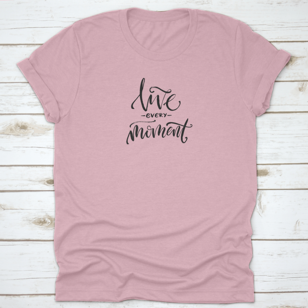 A stylish 'Live Every Moment' tee shirt displayed on a mannequin, showcasing its comfortable fit and inspirational design.