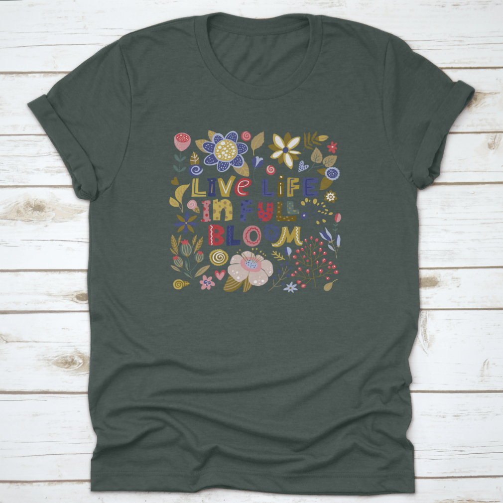A stylish t-shirt featuring the motivational quote 'Live Life In Full Bloom' designed with vibrant colors and a classic fit, perfect for inspiring positivity.