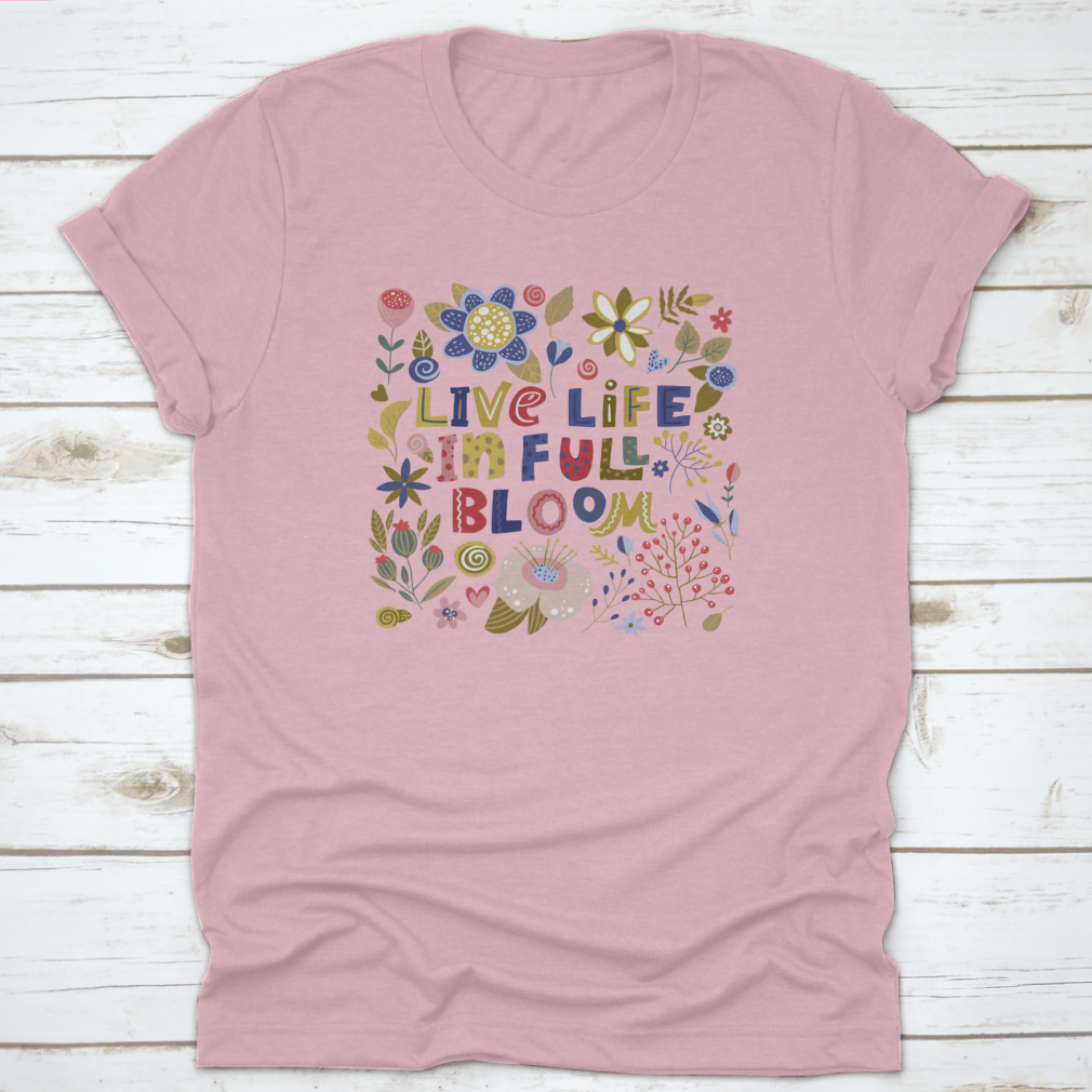 A stylish t-shirt featuring the motivational quote 'Live Life In Full Bloom' designed with vibrant colors and a classic fit, perfect for inspiring positivity.