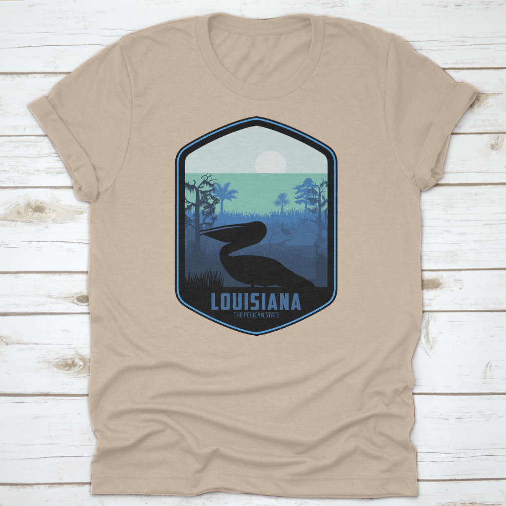 A stylish graphic T-shirt featuring the artistic design of Louisiana's Pelican State, made from soft cotton fabric.