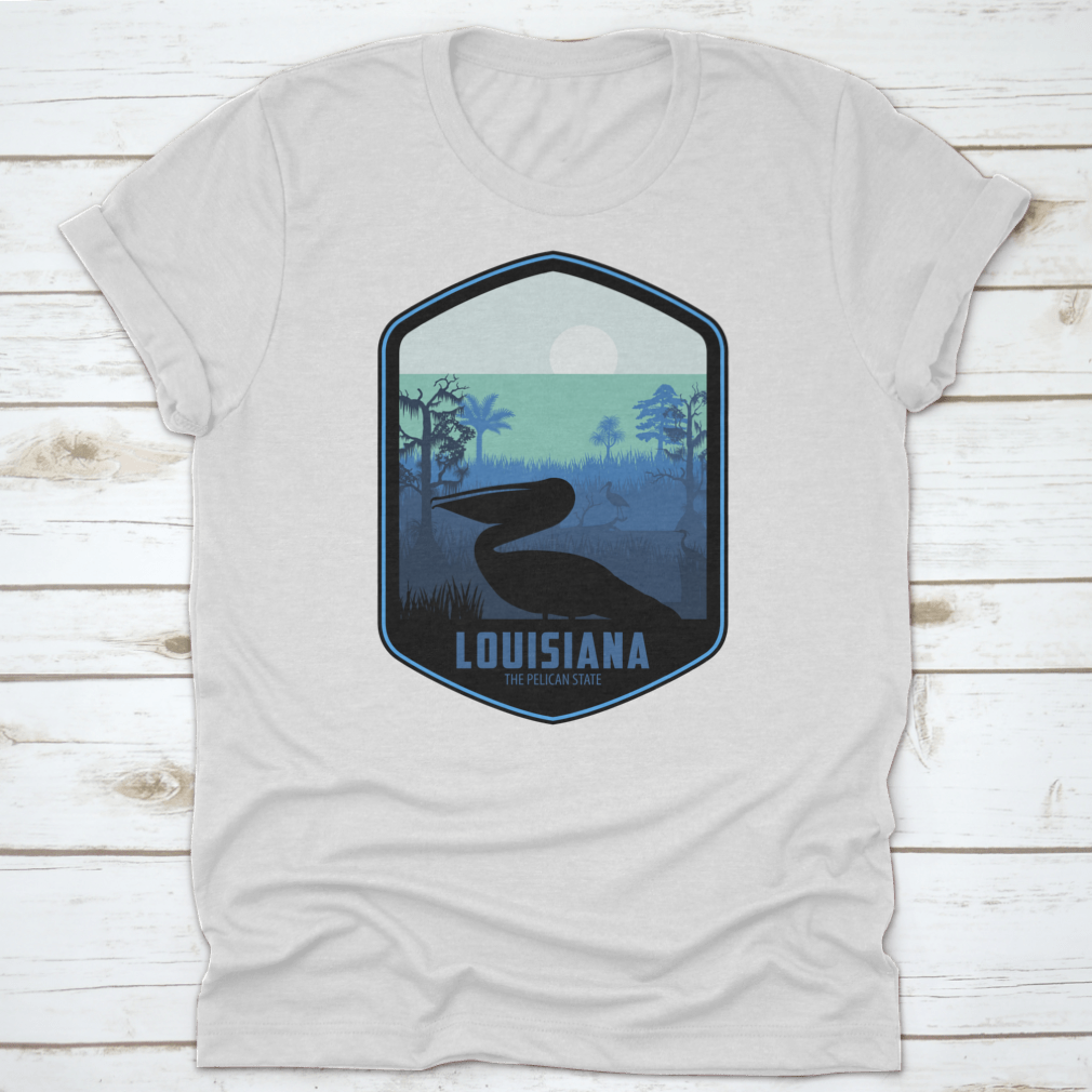A stylish graphic T-shirt featuring the artistic design of Louisiana's Pelican State, made from soft cotton fabric.