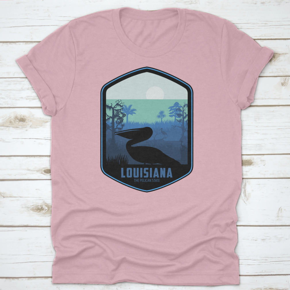 A stylish graphic T-shirt featuring the artistic design of Louisiana's Pelican State, made from soft cotton fabric.