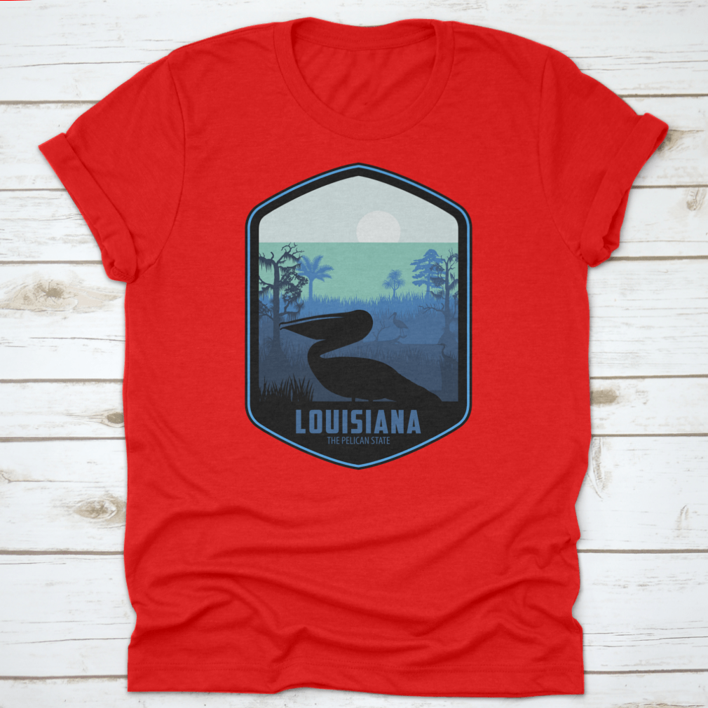A stylish graphic T-shirt featuring the artistic design of Louisiana's Pelican State, made from soft cotton fabric.
