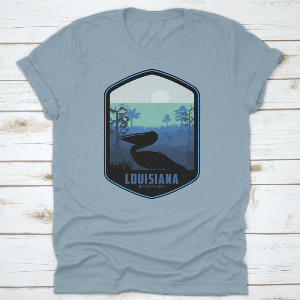 A stylish graphic T-shirt featuring the artistic design of Louisiana's Pelican State, made from soft cotton fabric.