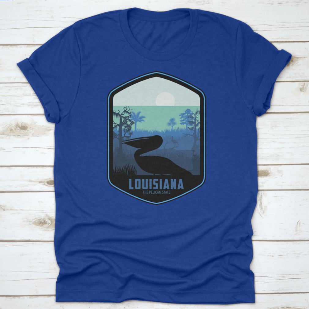 A stylish graphic T-shirt featuring the artistic design of Louisiana's Pelican State, made from soft cotton fabric.