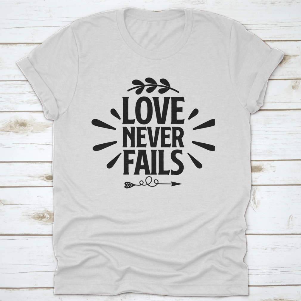 A collection of 'Love Never Fails' motivational T-shirts in various colors and sizes, showcasing inspirational quotes for all religions.