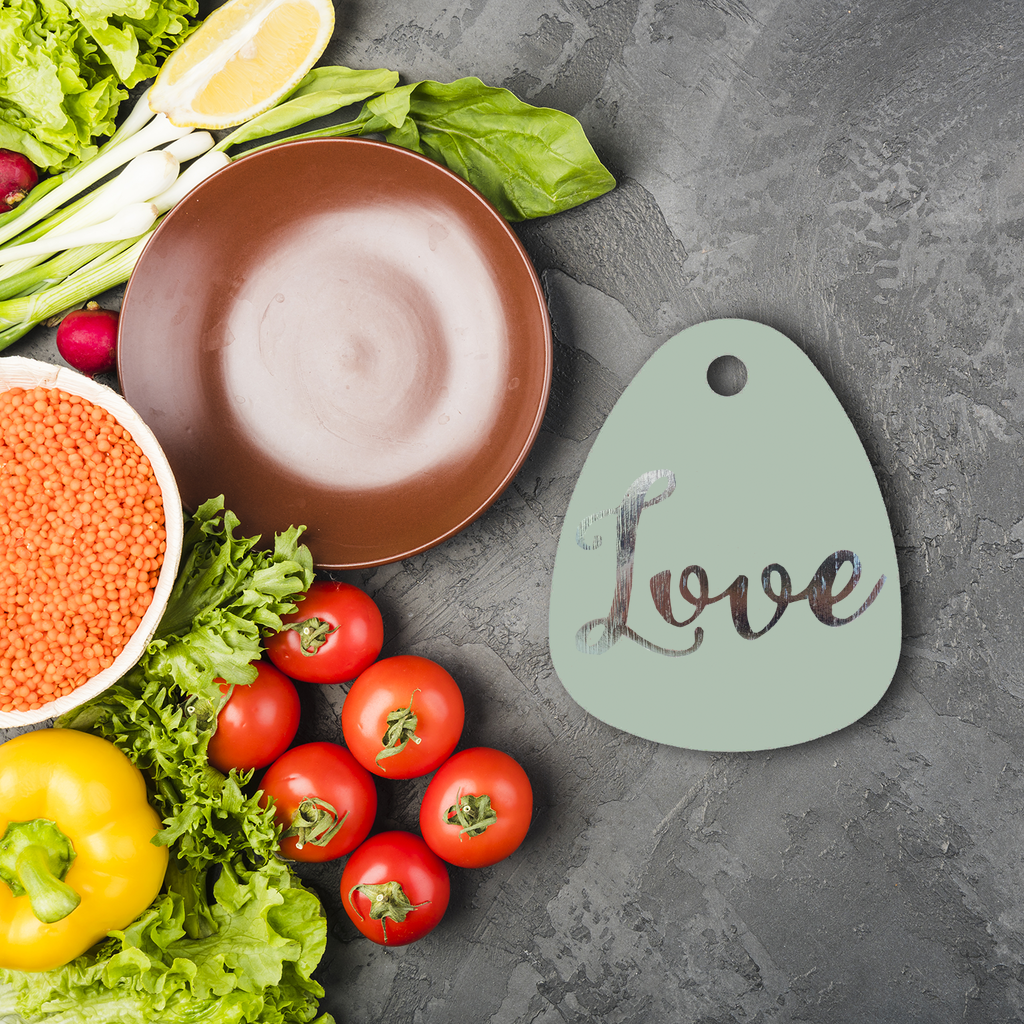 Round Love Sublimation Glass Cutting Board with custom design options, featuring a toughened glass surface and rubber feet.