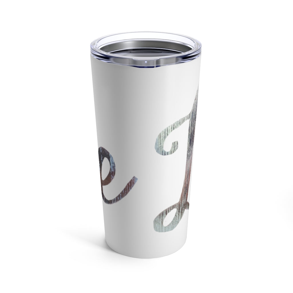 A stylish Love Tumbler 20oz made of stainless steel with a see-thru plastic lid, perfect for travel and outdoor use.