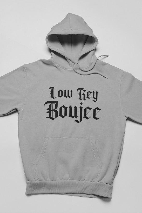 Low Key Boujee Hoodie featuring a cozy fleece lining and adjustable hood, designed by top artists for a unique style.