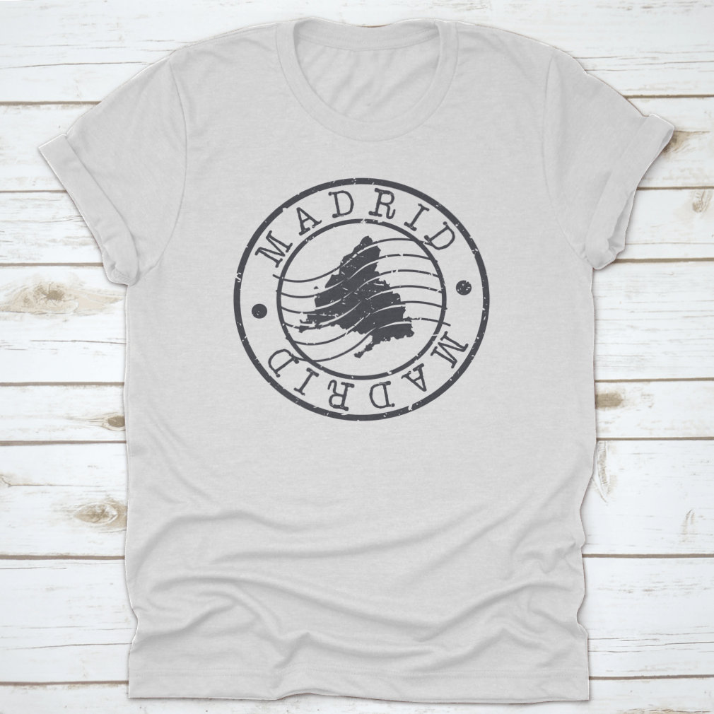A stylish cotton shirt featuring a Madrid Spain stamp design, perfect for travel enthusiasts.