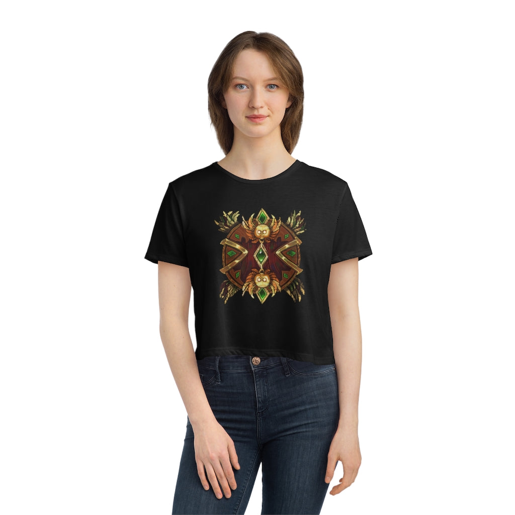 Magic Counter Shield Women's Flowy Cropped Tee in a stylish design, showcasing its flowy fit and modest crop style.