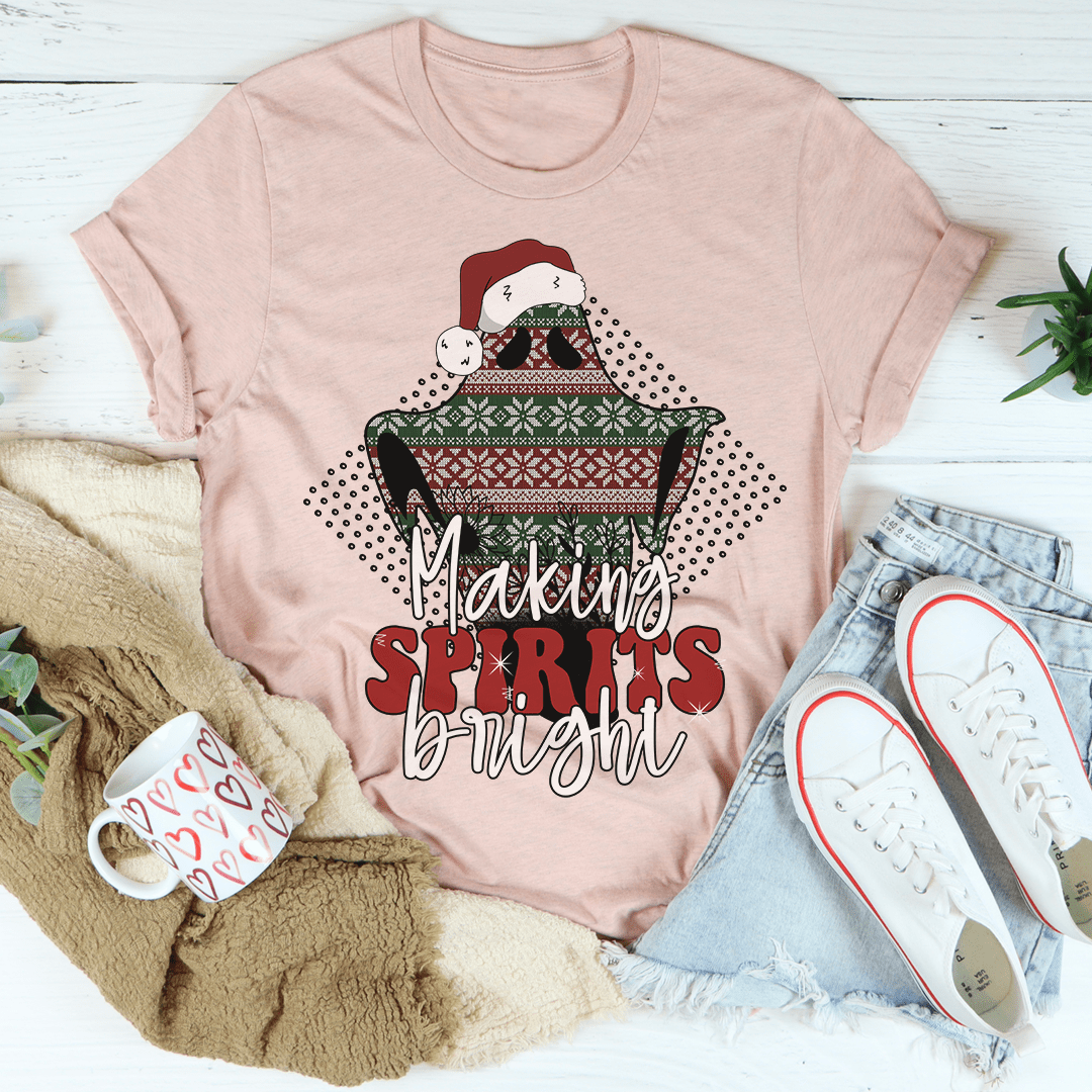 A festive Making Spirits Bright Tee featuring a vibrant Christmas-themed design, made from 100% soft cotton, perfect for holiday celebrations.