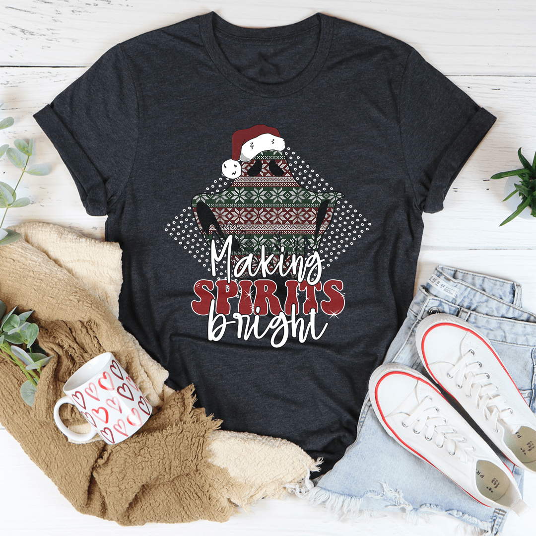 A festive Making Spirits Bright Tee featuring a vibrant Christmas-themed design, made from 100% soft cotton, perfect for holiday celebrations.