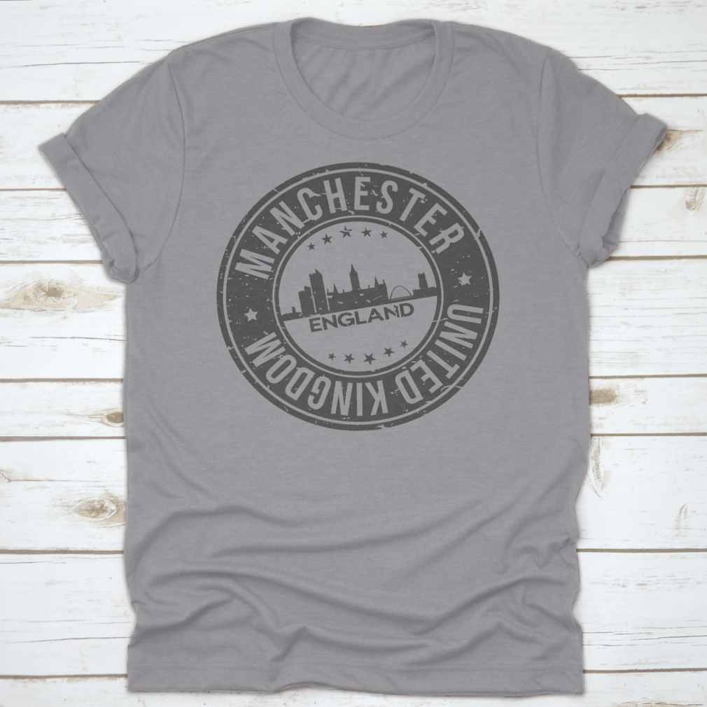 A stylish T-shirt featuring the Manchester England stamp logo, made from 100% cotton with a classic fit.