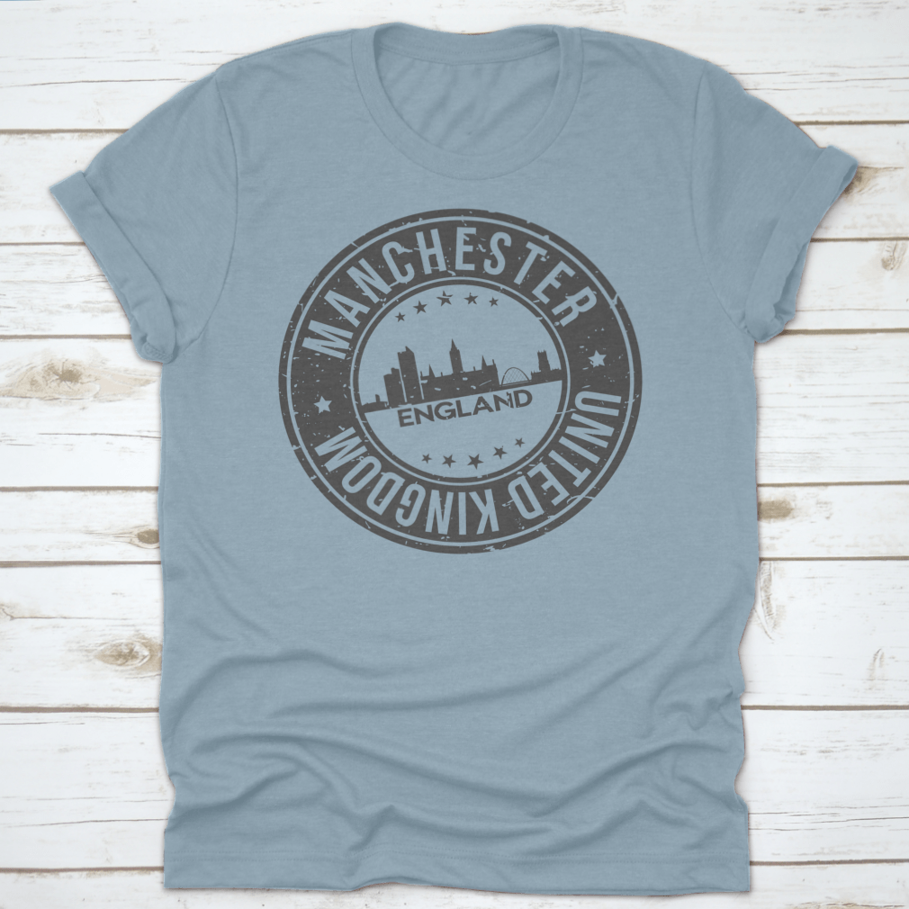 A stylish T-shirt featuring the Manchester England stamp logo, made from 100% cotton with a classic fit.