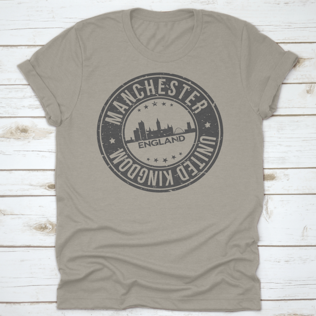 A stylish T-shirt featuring the Manchester England stamp logo, made from 100% cotton with a classic fit.