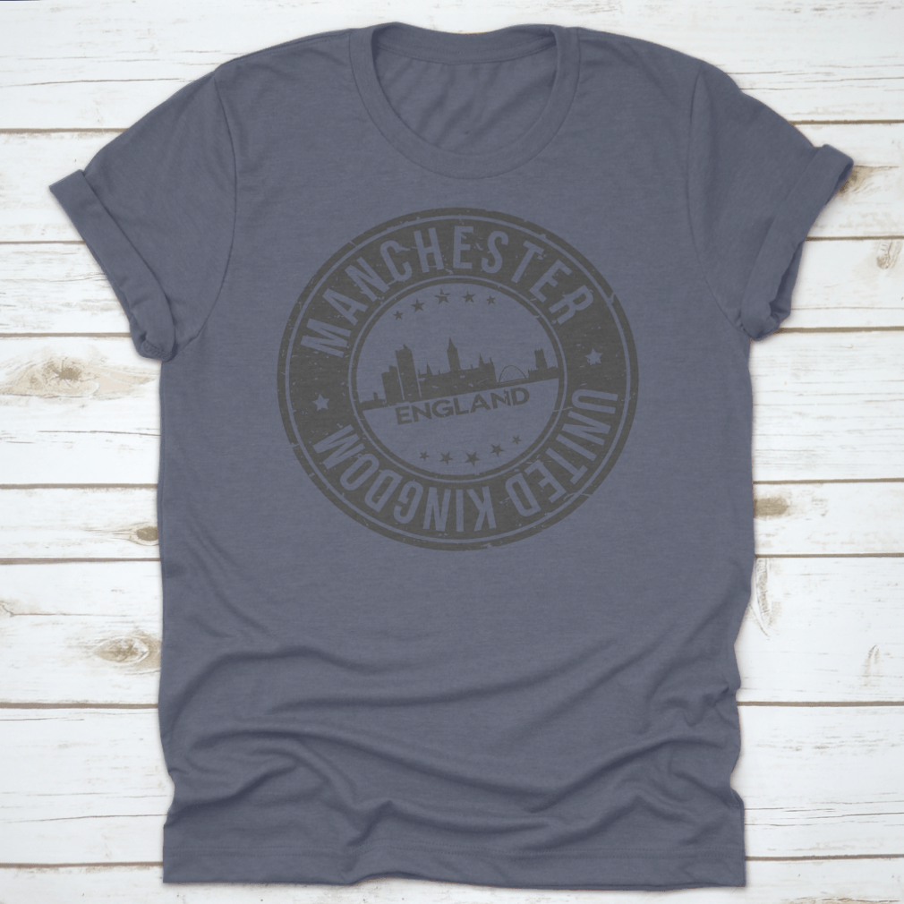 A stylish T-shirt featuring the Manchester England stamp logo, made from 100% cotton with a classic fit.