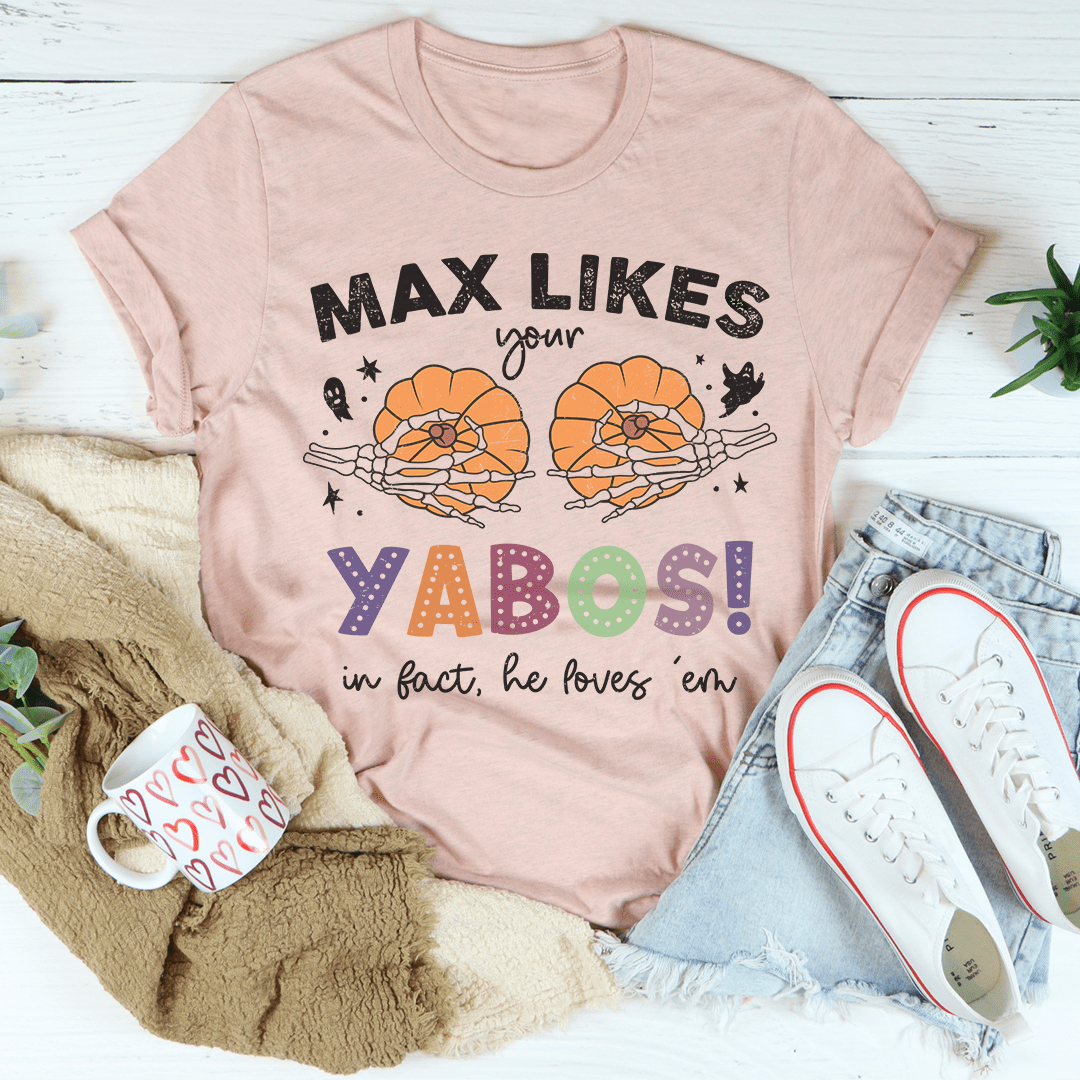 Max Likes Your Yabos Halloween Tee featuring a vibrant design, made from 100% soft cotton, perfect for festive celebrations.