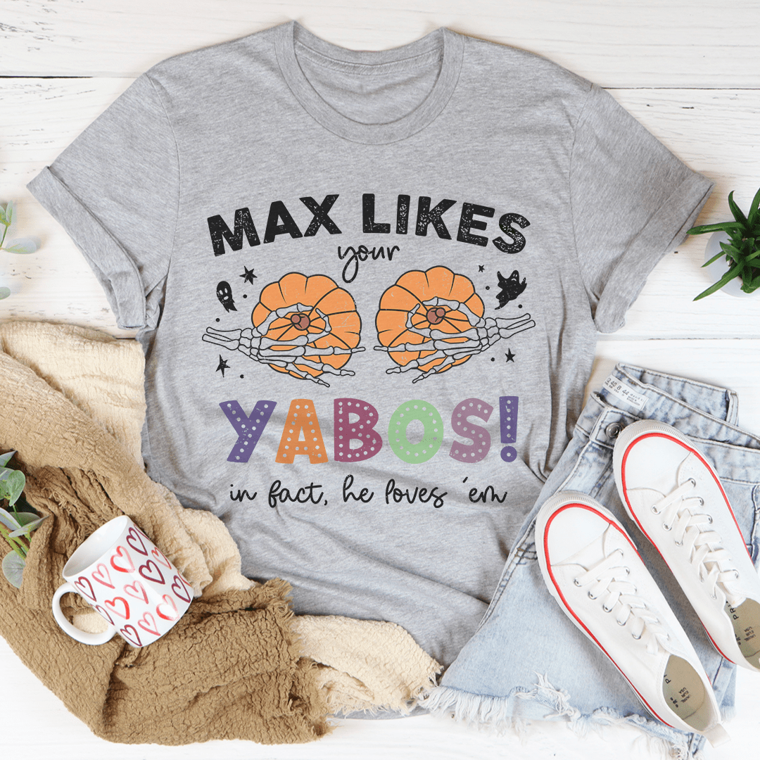 Max Likes Your Yabos Halloween Tee featuring a vibrant design, made from 100% soft cotton, perfect for festive celebrations.