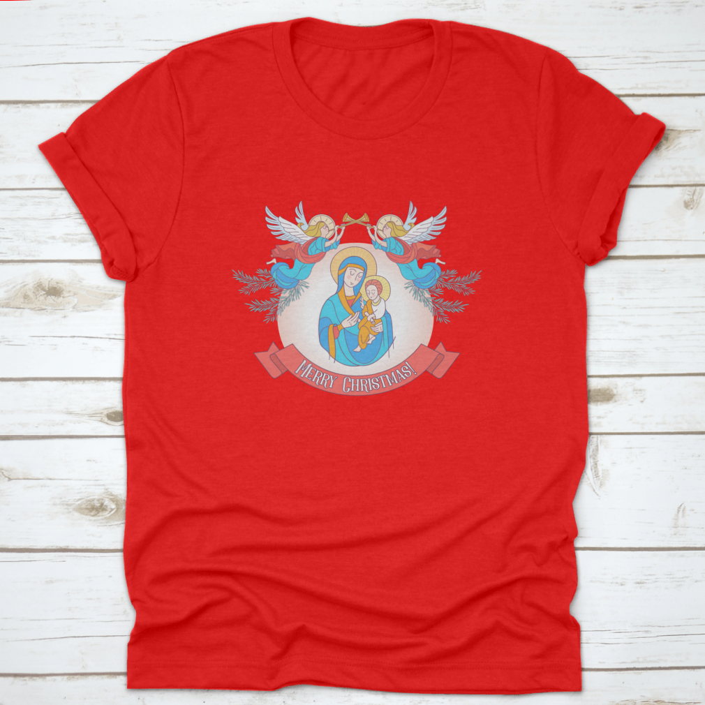 A festive t-shirt featuring Blessed Mary in a blue tunic holding Baby Jesus, perfect for Christmas celebrations.