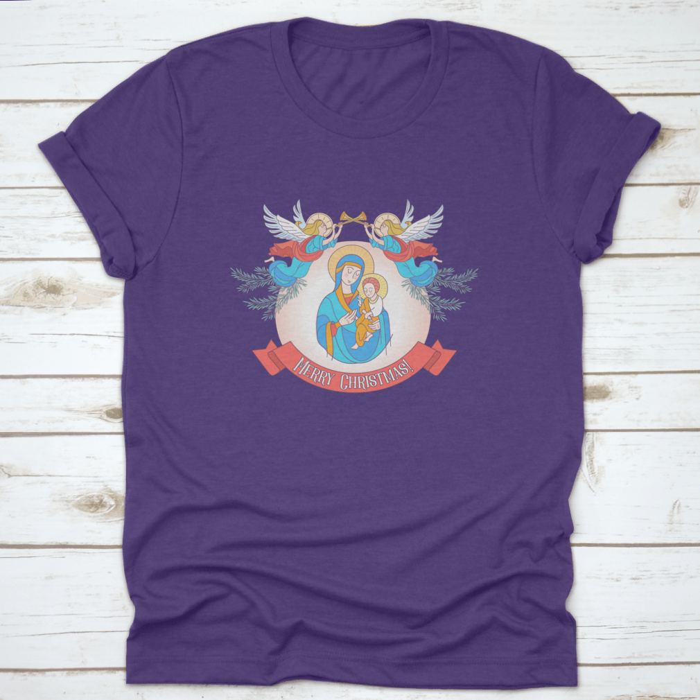 A festive t-shirt featuring Blessed Mary in a blue tunic holding Baby Jesus, perfect for Christmas celebrations.