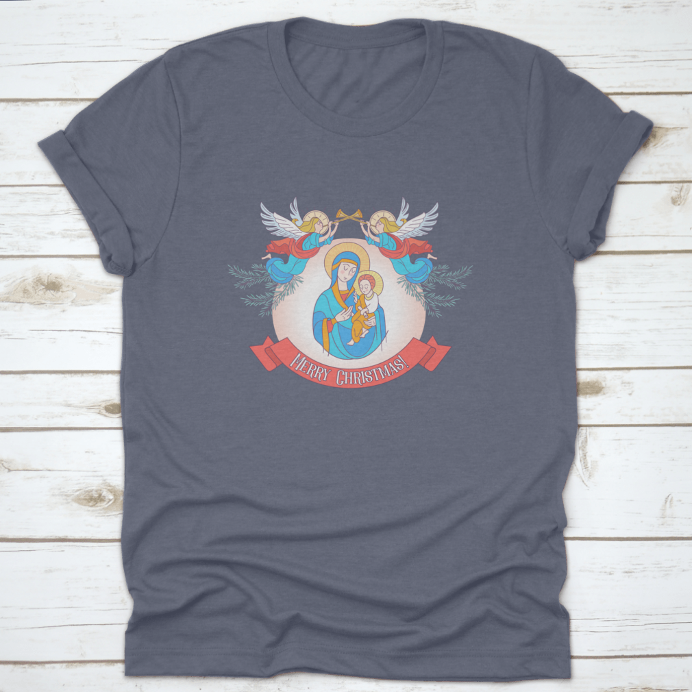 A festive t-shirt featuring Blessed Mary in a blue tunic holding Baby Jesus, perfect for Christmas celebrations.