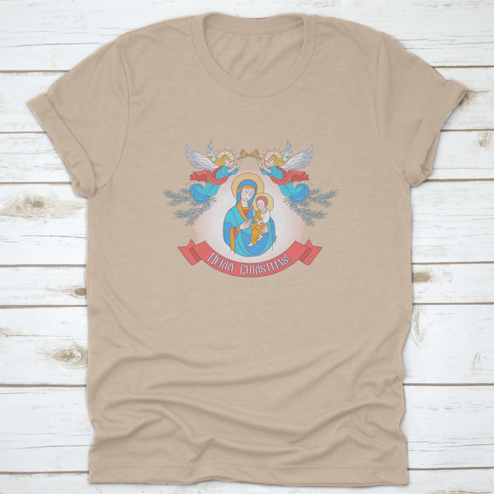 A festive t-shirt featuring Blessed Mary in a blue tunic holding Baby Jesus, perfect for Christmas celebrations.