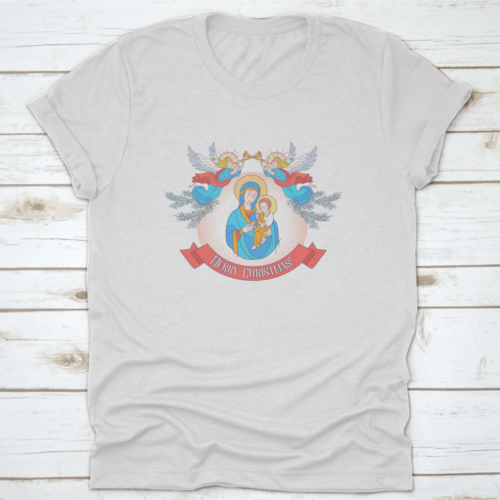 A festive t-shirt featuring Blessed Mary in a blue tunic holding Baby Jesus, perfect for Christmas celebrations.