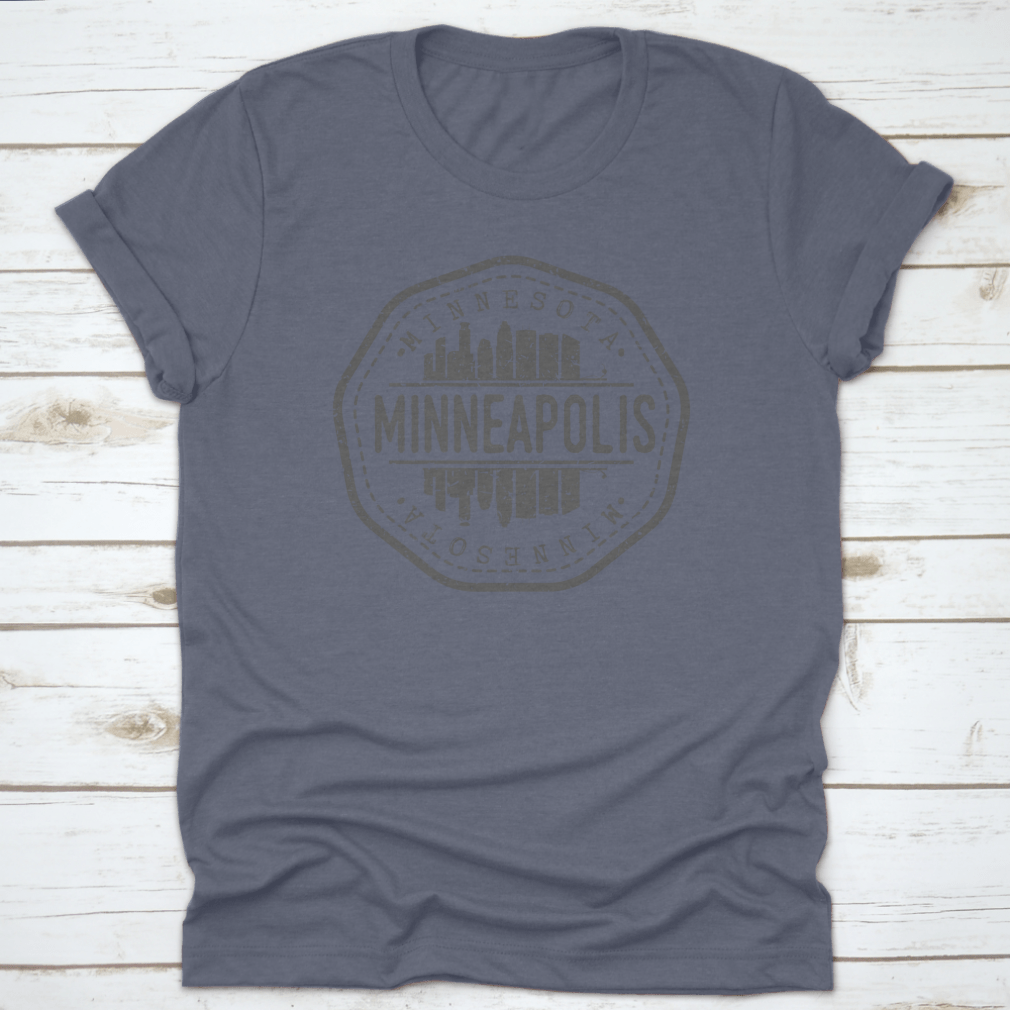 Minneapolis Skyline Stamp Postmark T-Shirt showcasing a silhouette design on a soft cotton fabric.
