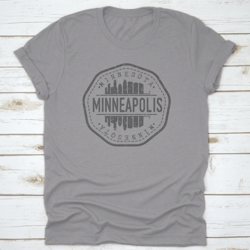 Minneapolis Skyline Stamp Postmark T-Shirt showcasing a silhouette design on a soft cotton fabric.